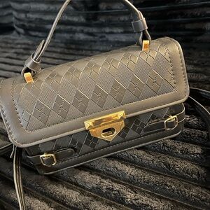 Black small Handbag with Gold Accents